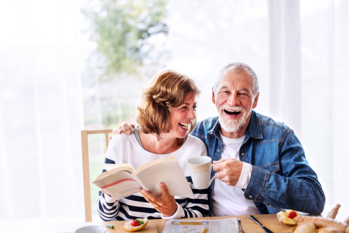 elderly coupe having breakfast